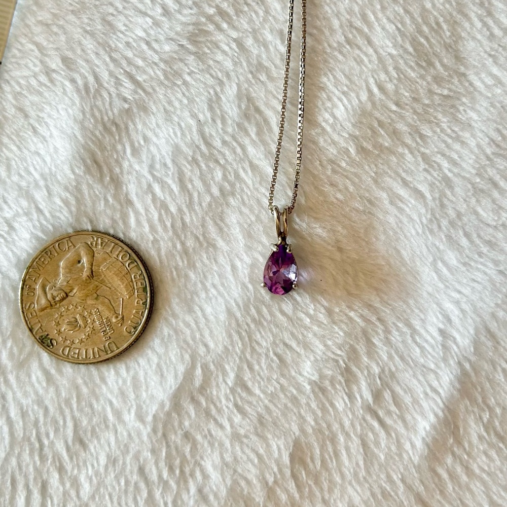 EUC purple stone on a silver chain